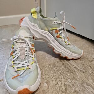 Sorel Women's Kinetic Breakthru Athletic Shoes in White, Orange, and Yellow